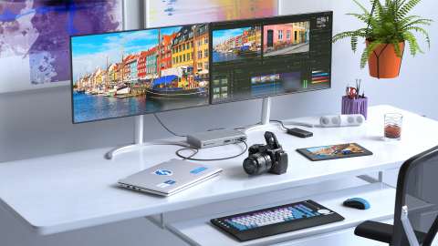 A workspace with multiple monitors and devices connected using Thunderbolt™ 4 ports and cables